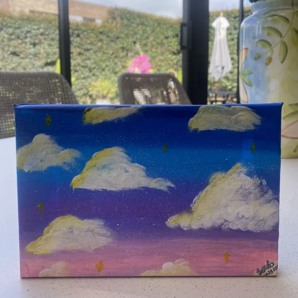 Sky Full of Dreams, cielo azul y rosado con nubes pintado por Jerónimo Galvis